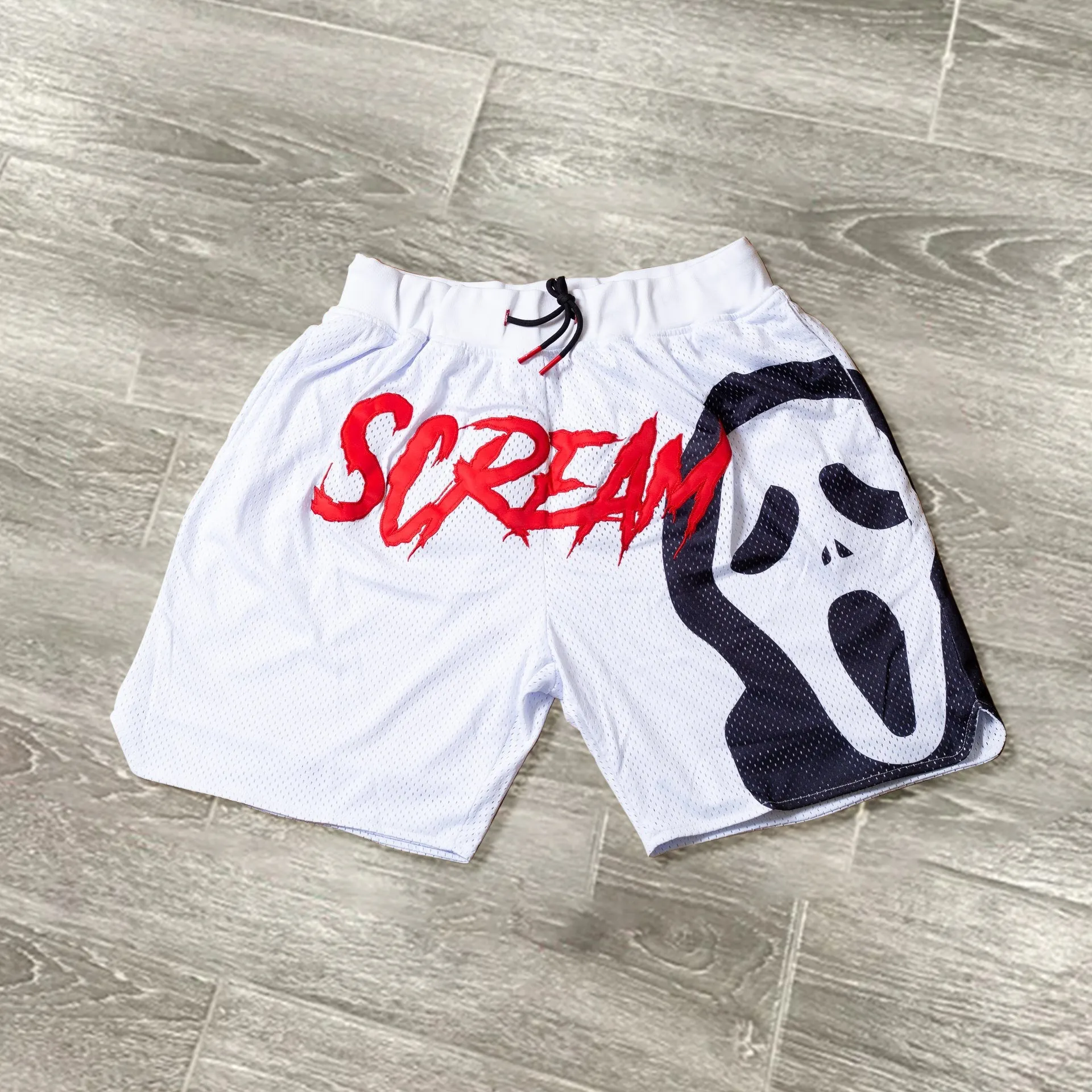 White casual film print sports shorts