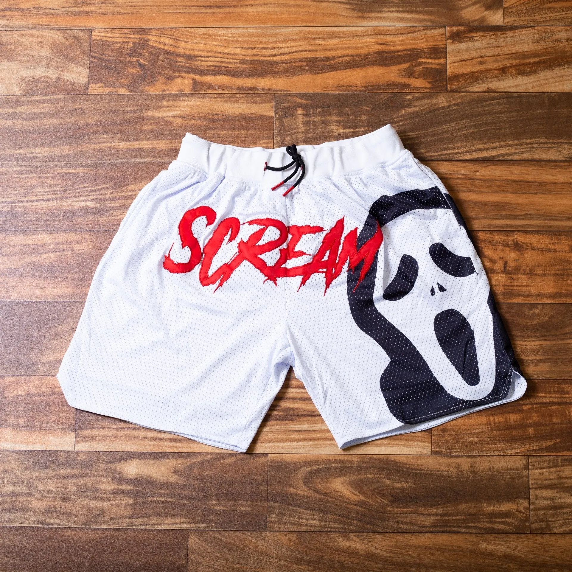 White casual film print sports shorts